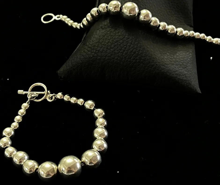 Pulsera_Bolas de plata que disminuyen Ch, 19 cm