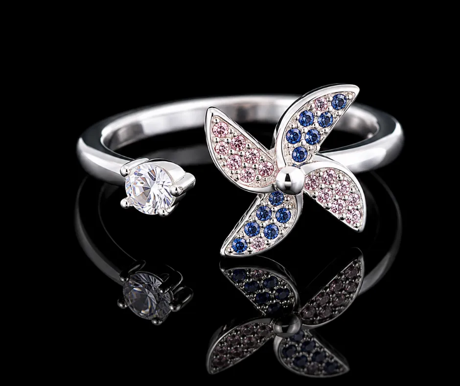 Anillo giratorio_ ajustable_antiestres_Rehilete en tonos rosa & azul (ANI-45)
